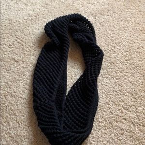 Black knitted infinity scarf.